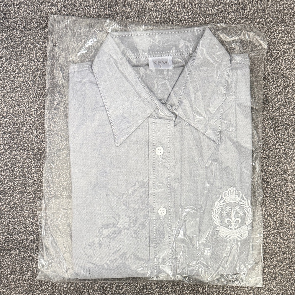 Classic Light Gray Button-Down Shirt with Embroidered Crest